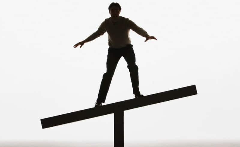 Balance and stability on a narrow beam for focus and confidence.